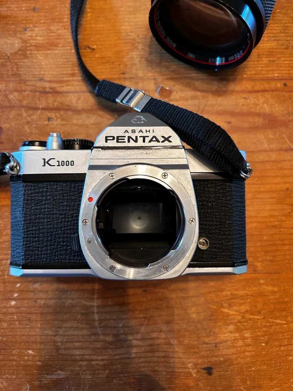 Asahi PENTAX K1000 SLR 35mm camera and Vivitar Series 1 macro-focusing zoom.